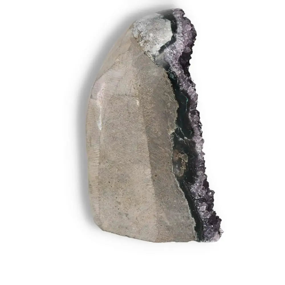 Amethyst cut base geode by Sylvia Crystals, showcasing premium craftsmanship and spiritual tranquility benefits.