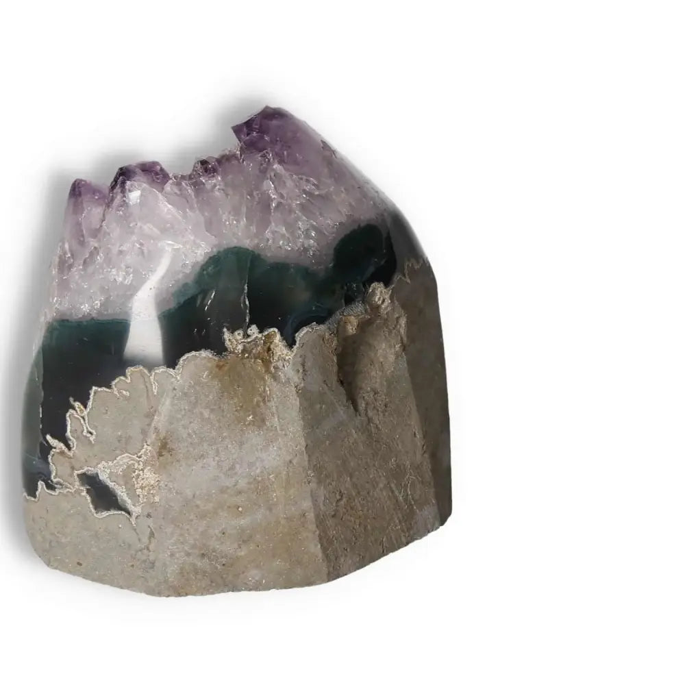 Exquisite Amethyst cut base geode from Sylvia Crystals showcasing its vibrant colors and natural beauty for stress reduction and energy enhancement.