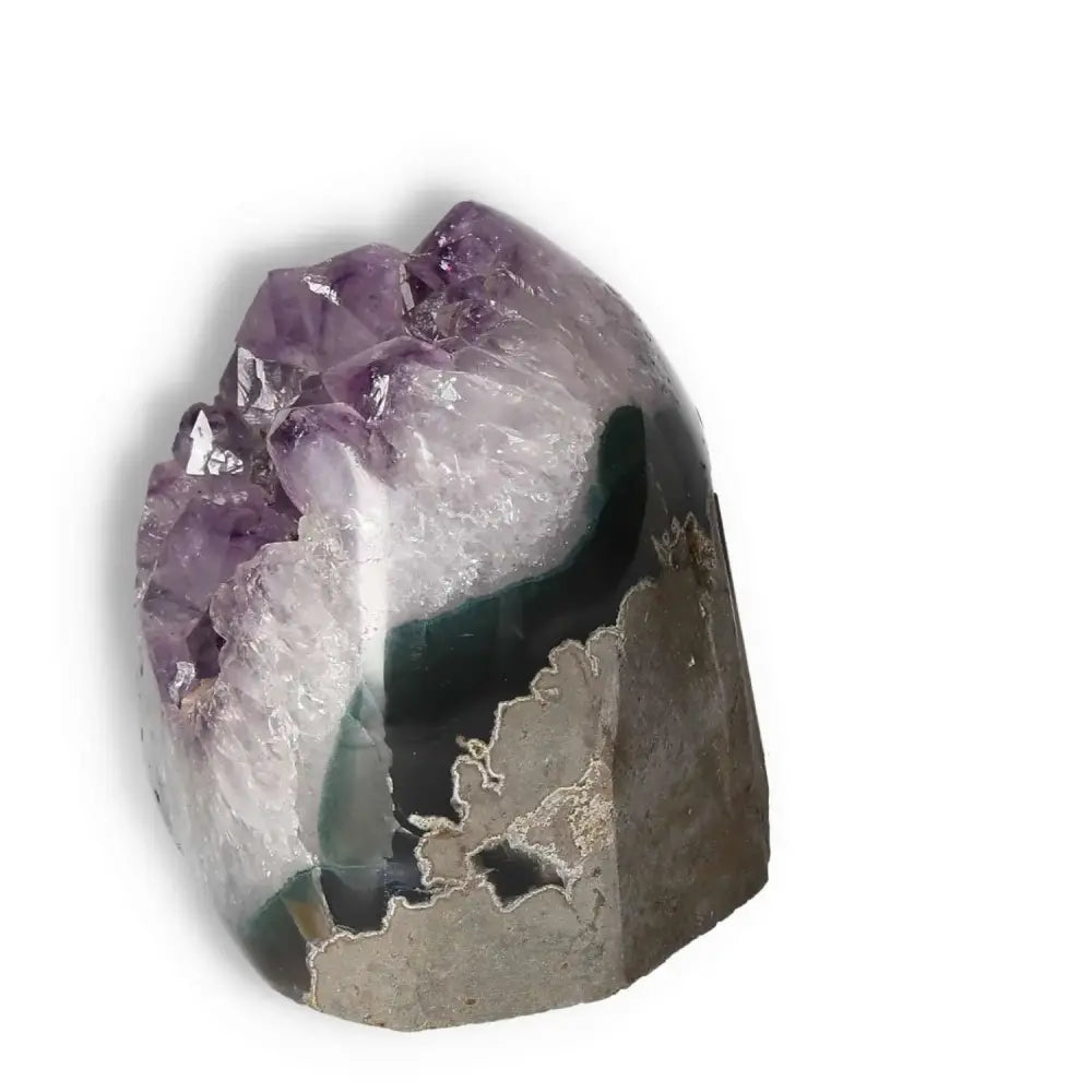 Amethyst cut base geode from Sylvia Crystals, showcasing exquisite handpicked quality for stress reduction and energy enhancement.