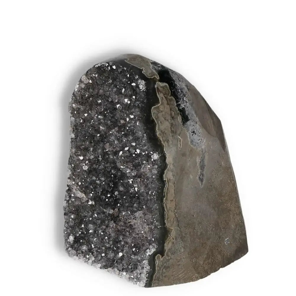 Amethyst cut base geode from Sylvia Crystals showcasing natural beauty and stress-relief properties, ideal for spiritual illumination.