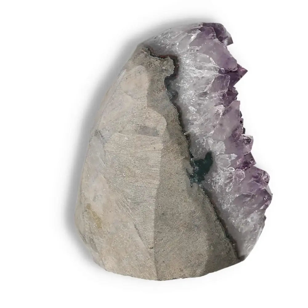 Amethyst cut base geode with rich purple hues, showcasing natural crystalline formations, from Sylvia Crystals' premium collection.