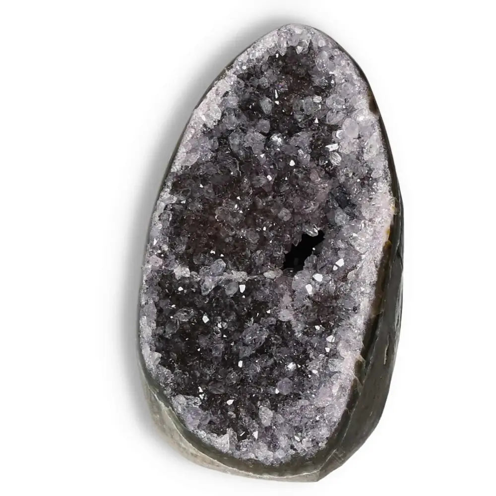 Amethyst cut base geode crystal from Sylvia Crystals, known for stress reduction and emotional stability, featuring a natural sparkling surface.