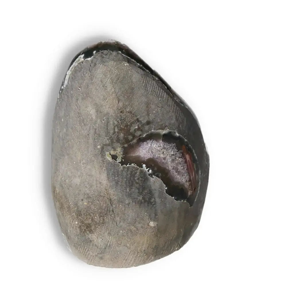 Amethyst cut base geode from Sylvia Crystals, showcasing its natural beauty and stress-relieving properties.