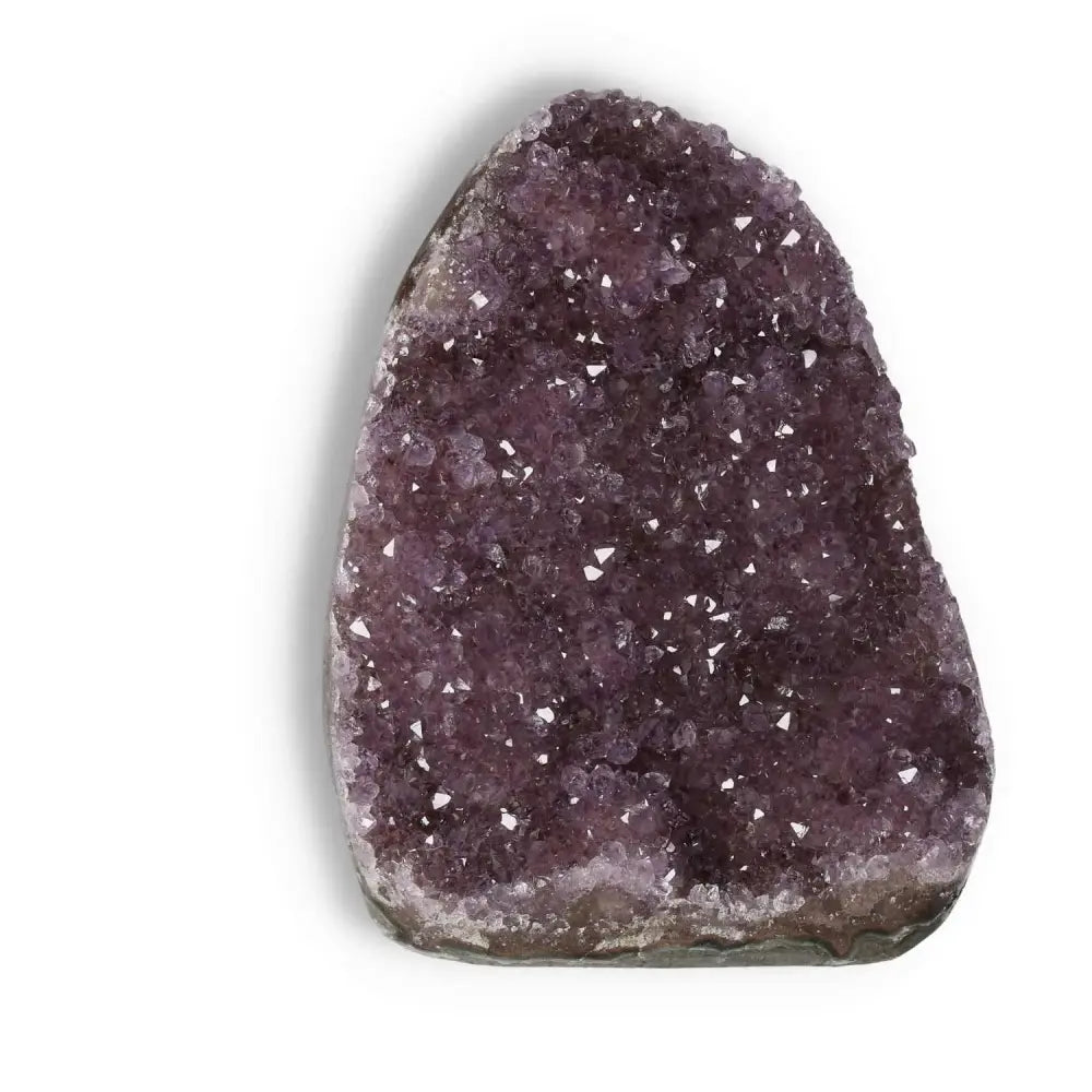 Amethyst cut base geode from Sylvia Crystals, luxury centerpiece with spiritual significance and premium craftsmanship.