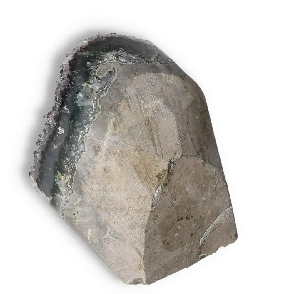 Amethyst cut base geode from Sylvia Crystals, displaying its exquisite craftsmanship and natural beauty, ideal for decor and well-being.