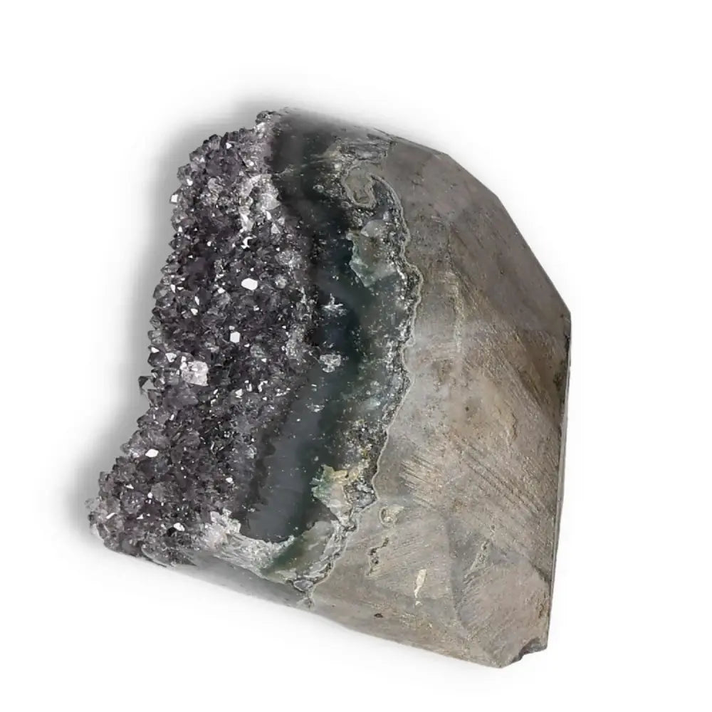 Amethyst cut base geode from Sylvia Crystals showcasing purple crystals, enhancing space aesthetics and promoting well-being.