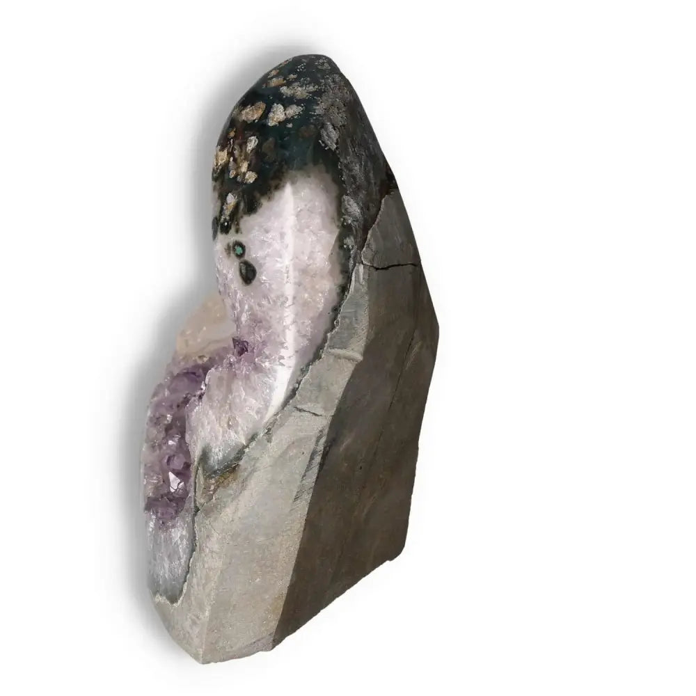 Amethyst cut base geode from Sylvia Crystals with a unique design, perfect for enhancing beauty and tranquility in any space.