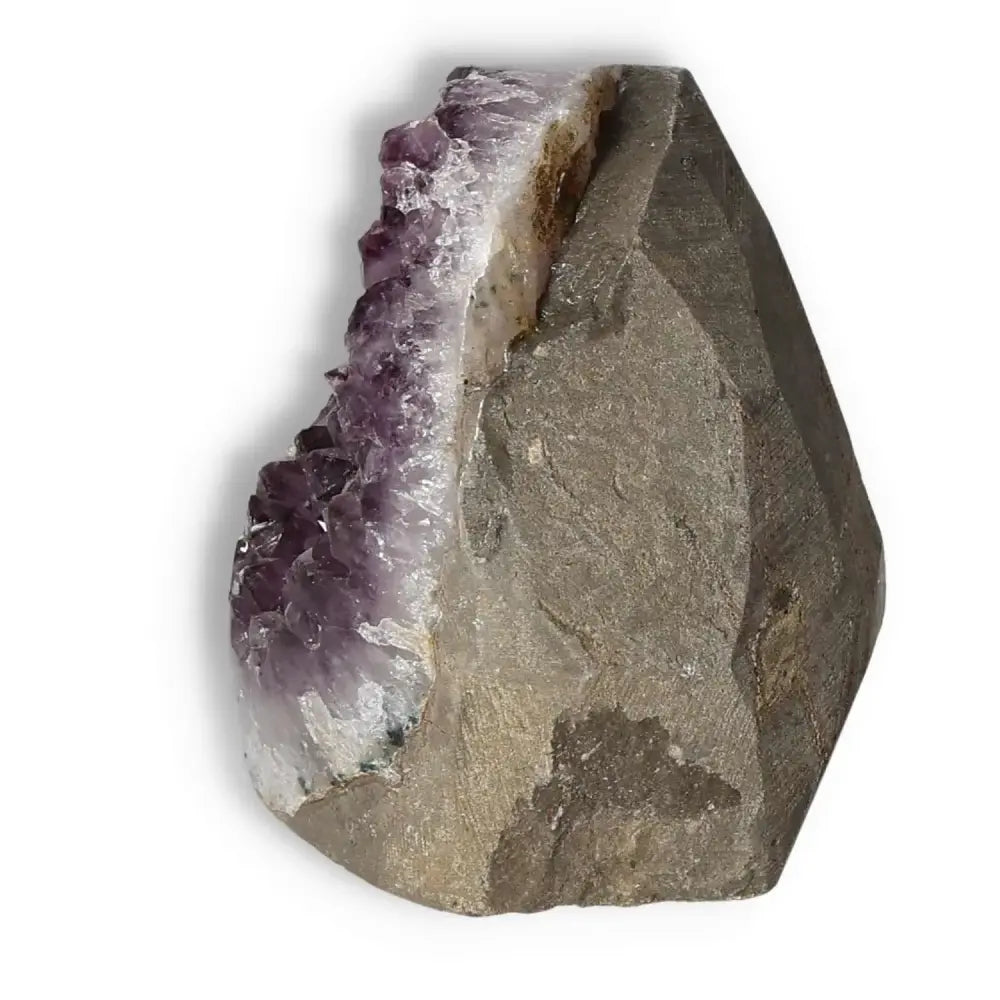 Amethyst cut base geode by Sylvia Crystals, enhancing emotional stability, reducing stress, and promoting concentration.