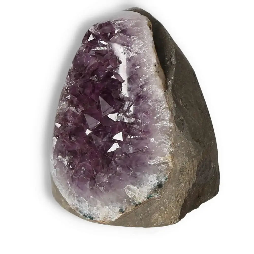 Amethyst cut base geode by Sylvia Crystals; enhances concentration and reduces stress with exquisite purple crystal formations.