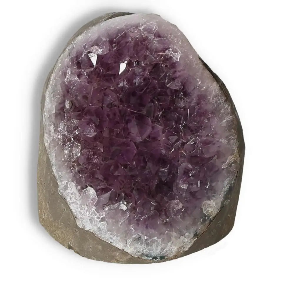Amethyst cut base geode by Sylvia Crystals, enhancing emotional stability and concentration with mesmerizing purple hues.
