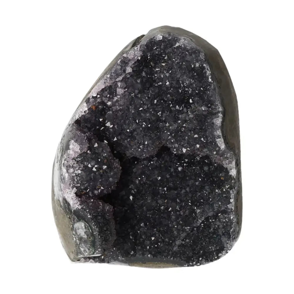 Amethyst cut base geode from Sylvia Crystals, ideal for stress reduction and energy boost, enhancing emotional stability and tranquility.