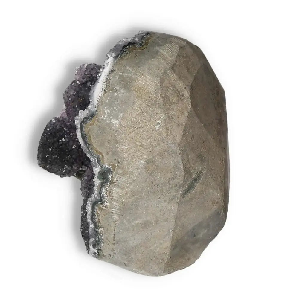 Amethyst cut base geode from Sylvia Crystals, enhancing space with style and spirituality, known for stress reduction and boosting energy.