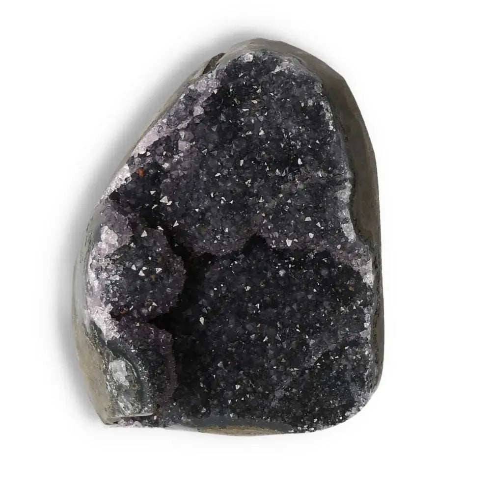 Amethyst cut base geode from Sylvia Crystals, showcasing sparkling purple crystals designed to enhance tranquility and emotional stability.