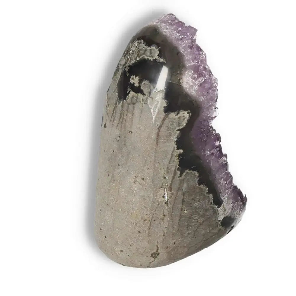 Amethyst cut base geode from Sylvia Crystals showcasing calming, energy-boosting properties in a luxurious, handpicked design.