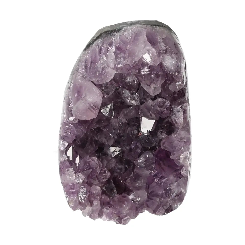 Amethyst cut base geode featuring natural purple crystals from Sylvia Crystals, showcasing spiritual elegance and transformative energy.