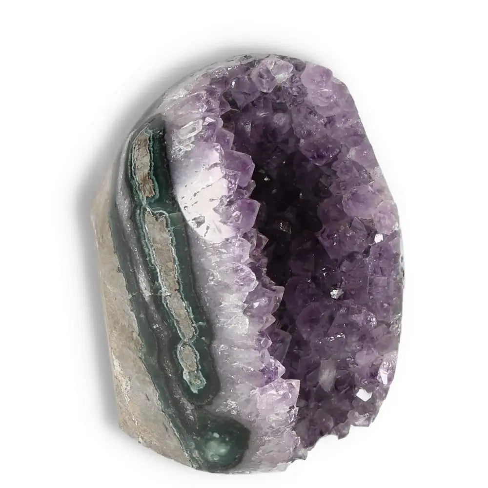 Amethyst cut base geode from Sylvia Crystals, enhancing stress relief and energy, ideal for elegant home or office decor.