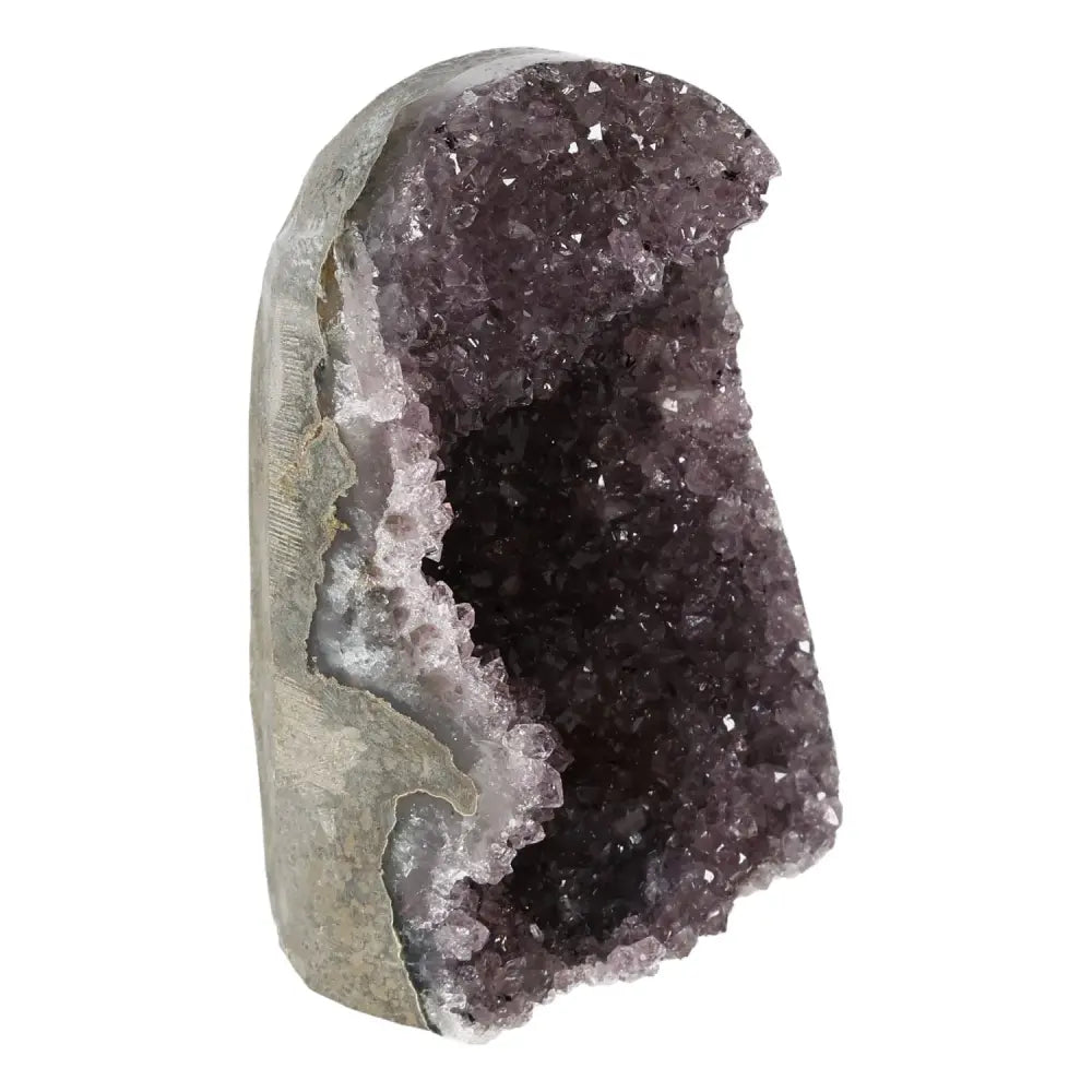 "Amethyst cut base geode by Sylvia Crystals, showcasing premium craftsmanship, elegance, and positive energy benefits."
