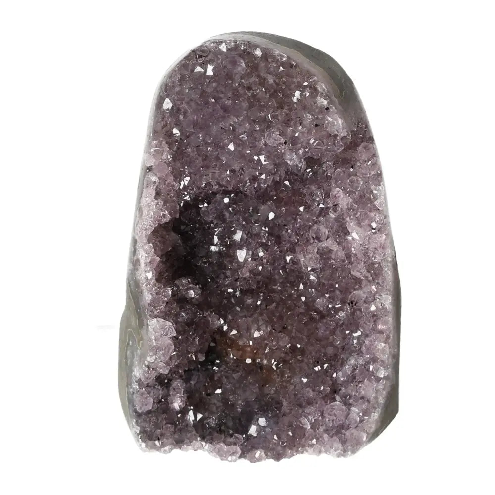 Amethyst cut base geode by Sylvia Crystals, enhancing home elegance and promoting positive energy alignment.