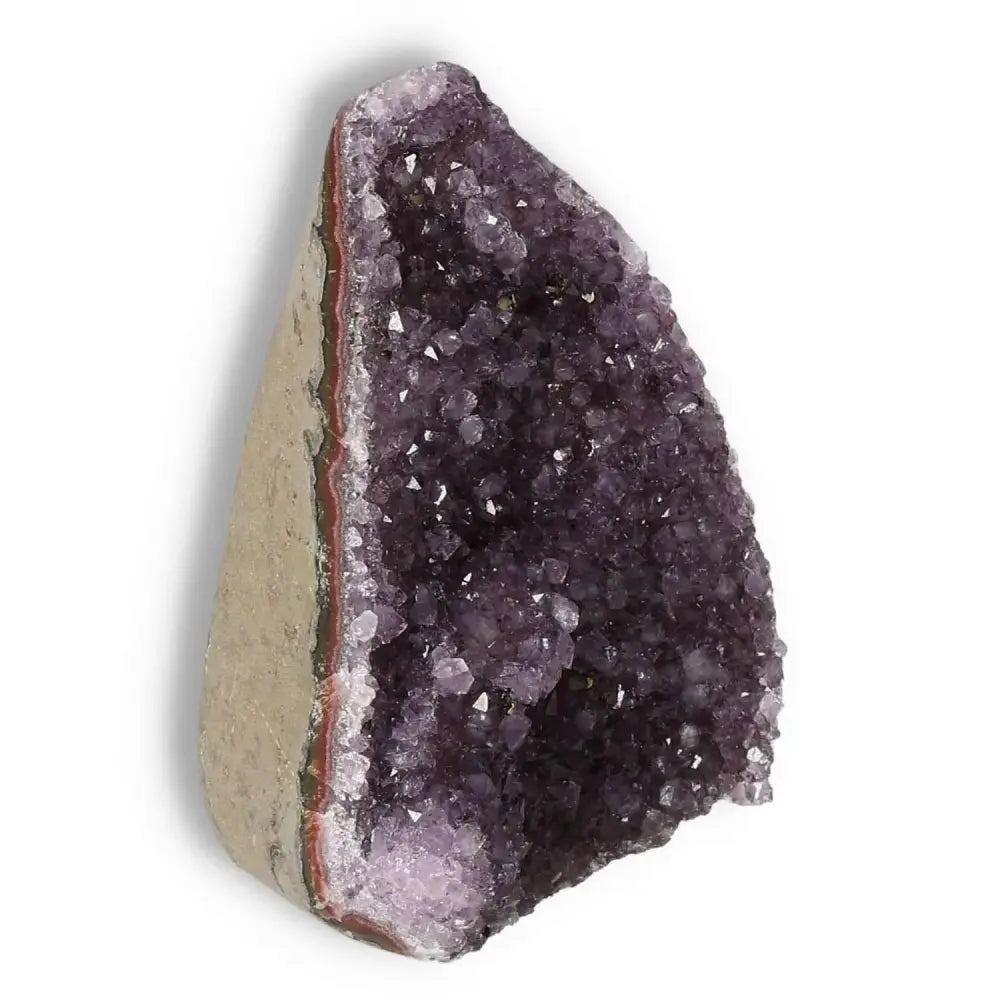 Amethyst cut base geode with deep purple hues from Sylvia Crystals, showcasing calming energy and enhancing concentration.