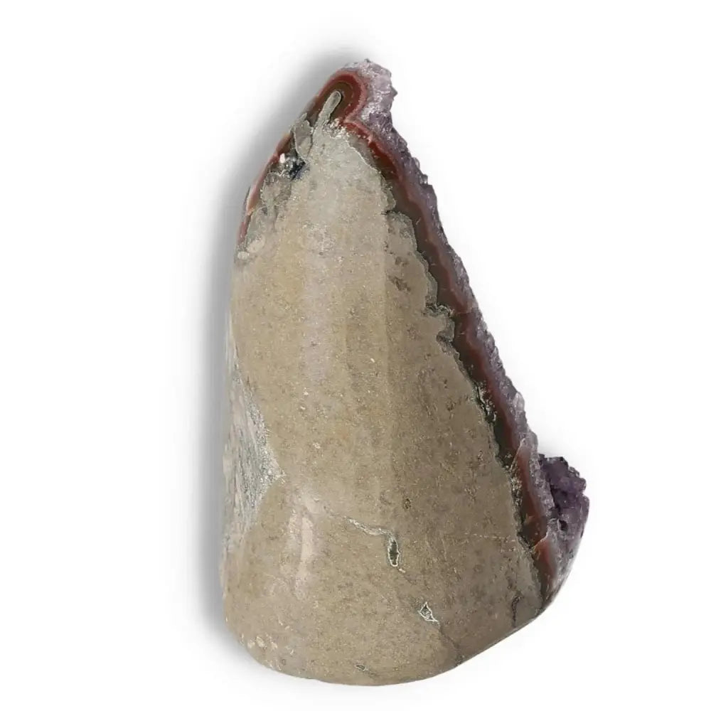 Amethyst cut base geode showcasing its natural crystalline structure and deep purple hues, sourced from Sylvia Crystals.