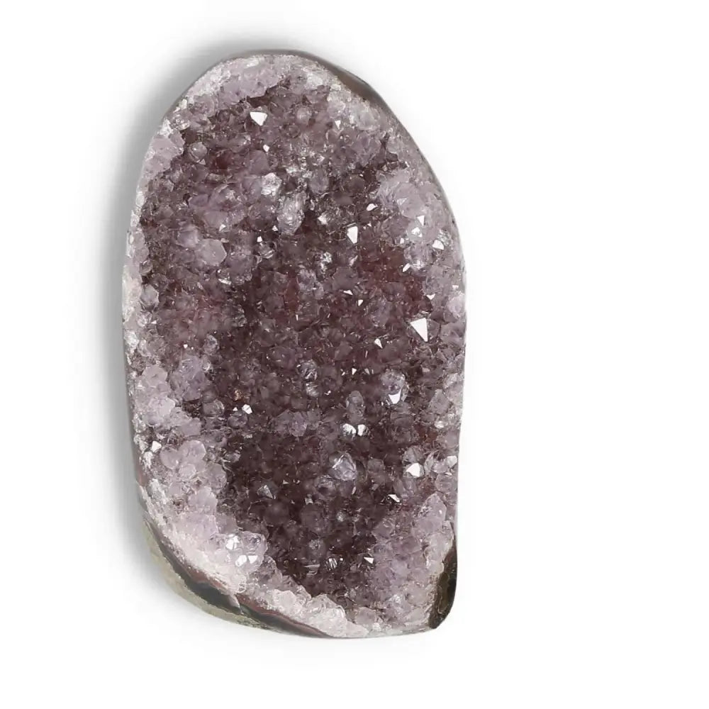 Amethyst cut base geode by Sylvia Crystals showcases luxury and stress-reducing properties, ideal for elegant home or office decor.