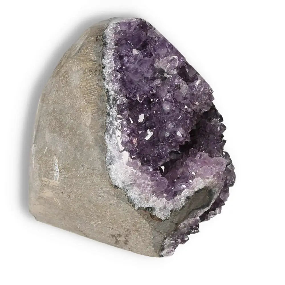 Amethyst cut base geode by Sylvia Crystals, luxury stone for stress reduction, concentration, emotional stability, and mental wellness.