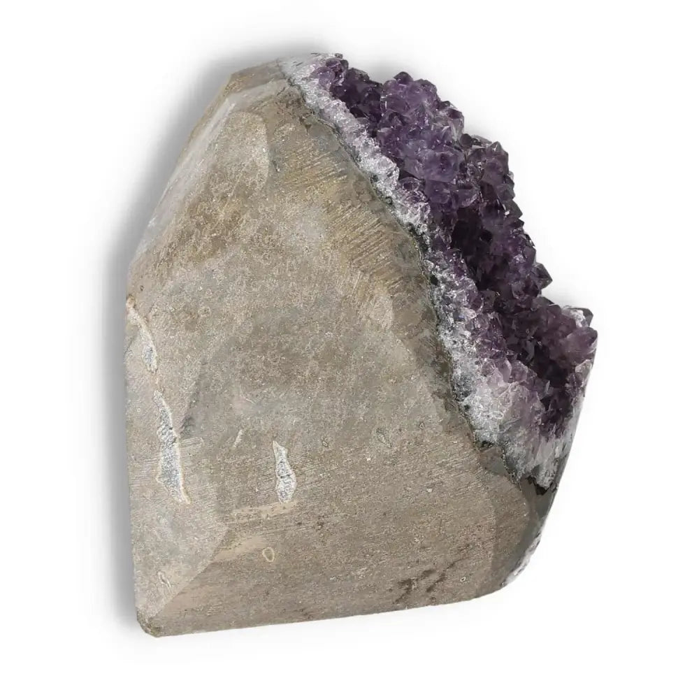 Amethyst cut base geode from Sylvia Crystals offering luxury, spiritual enhancement, and stress reduction benefits.
