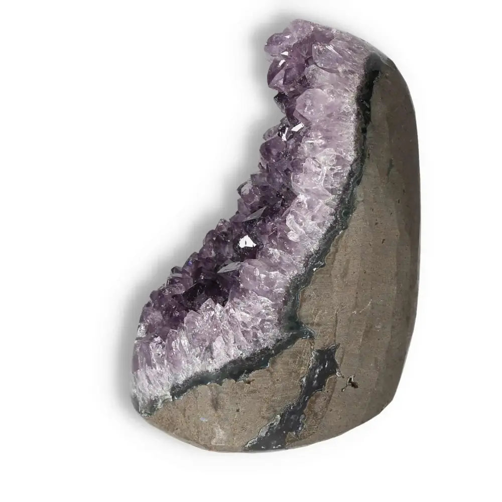 Amethyst cut base geode with vibrant purple crystals, enhancing energy and stress relief by Sylvia Crystals.