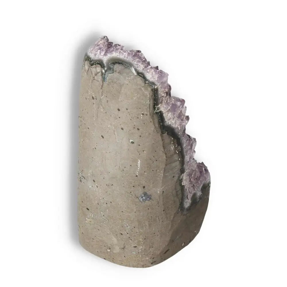 Amethyst cut base geode from Sylvia Crystals, showcasing natural beauty and stress-reducing properties.