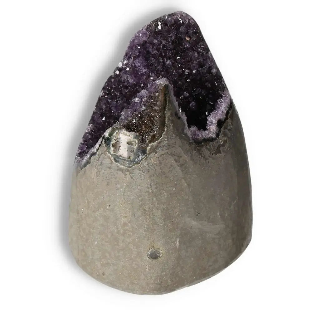 Amethyst cut base geode from Sylvia Crystals, showcasing purple crystals for stress reduction and emotional stability.