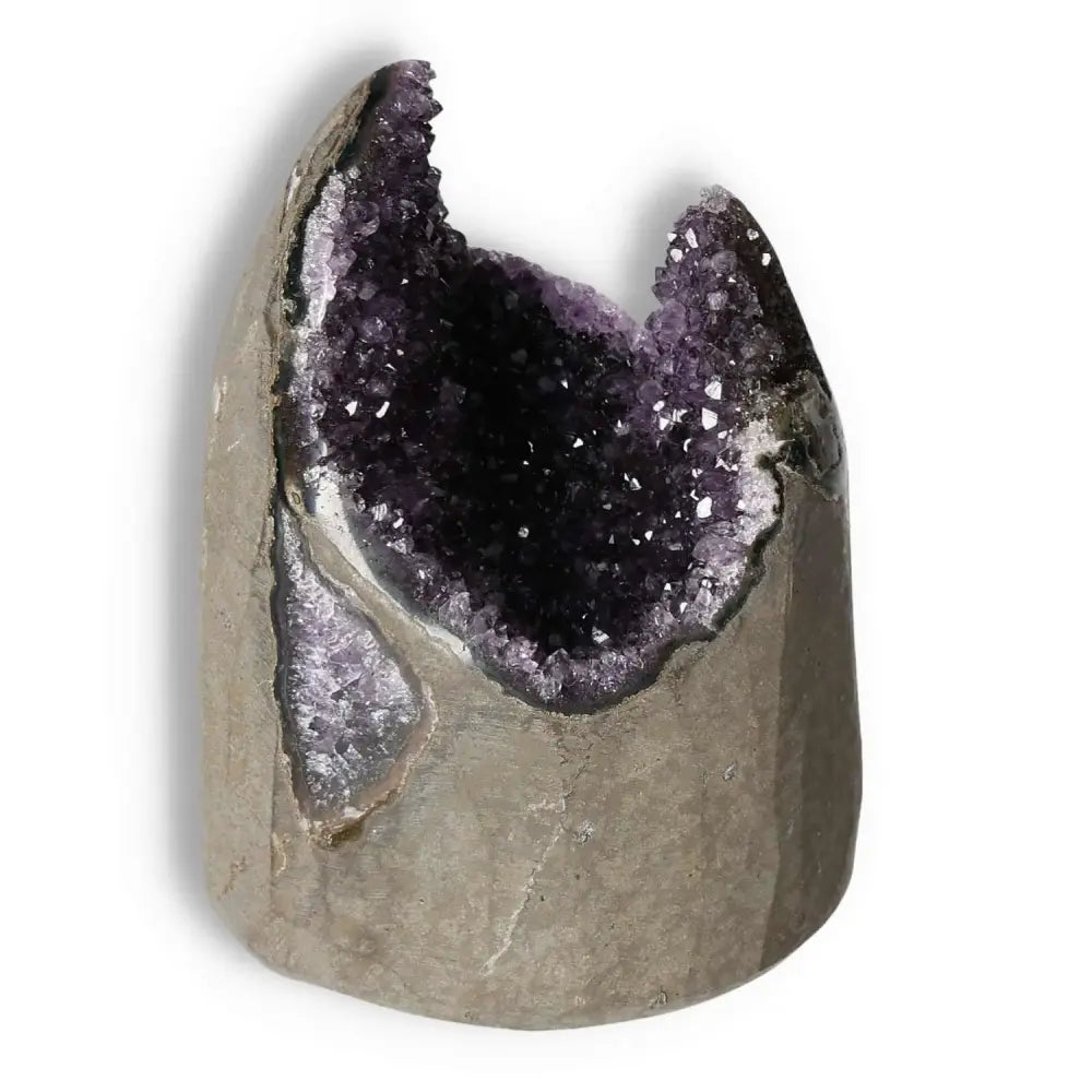 Premium Amethyst cut base geode by Sylvia Crystals, known for reducing stress and enhancing concentration, with a stunning deep purple hue.