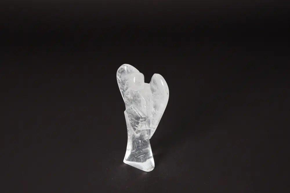 Elegant Angel Lemurian Quartz 11 cm figurine against dark background, ideal for stress reduction and emotional stability.