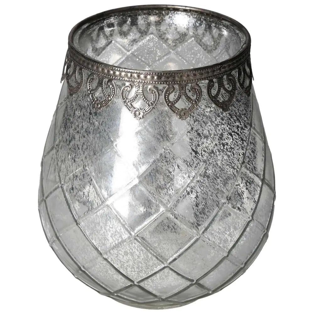 Elegant antique style lantern with intricate silver detailing and lattice glass design, perfect for timeless home decor accents.