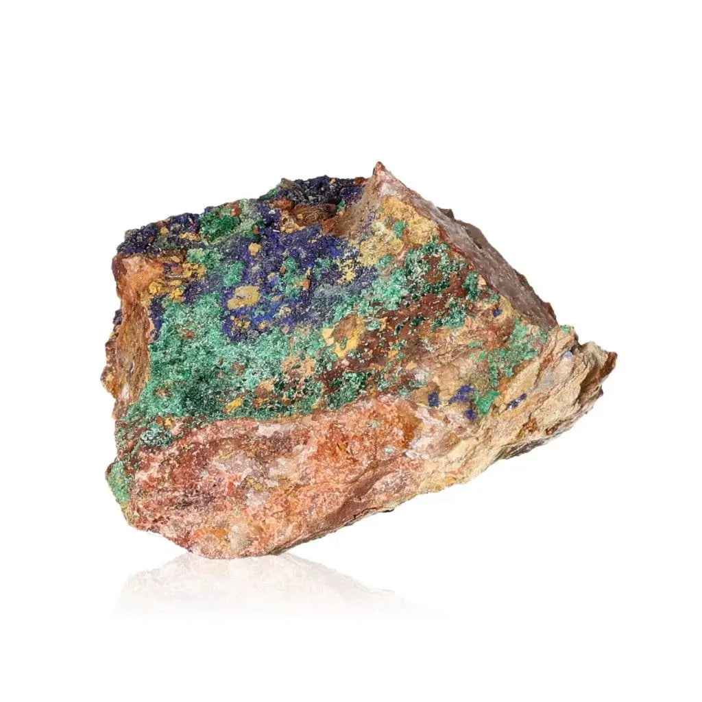 Raw azurite with malachite stone showcasing deep blue and green hues on a white background.