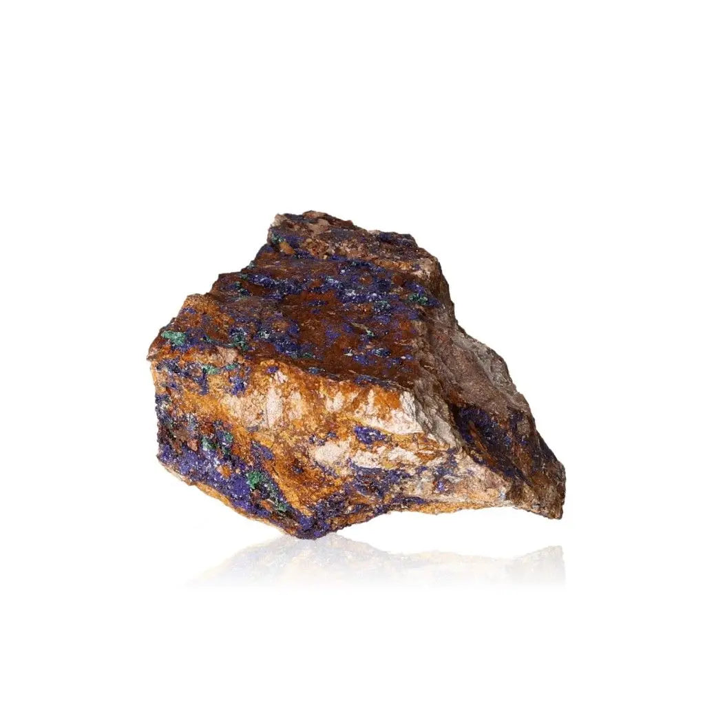 Raw Azurite and Malachite mineral specimen with deep blue and green hues, showcasing rich copper tones on a white background.