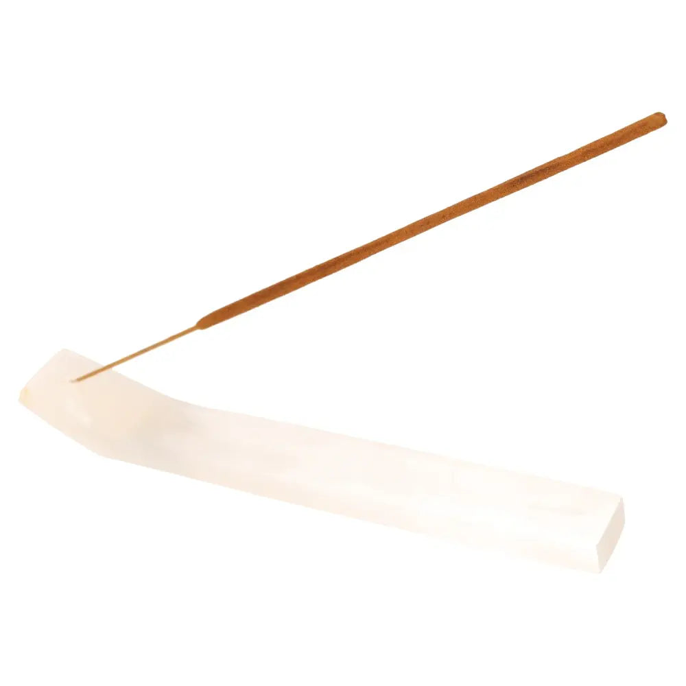 Incense stick on a white holder, featuring Bali Harmony Incense Blend for creating a serene and balanced atmosphere.