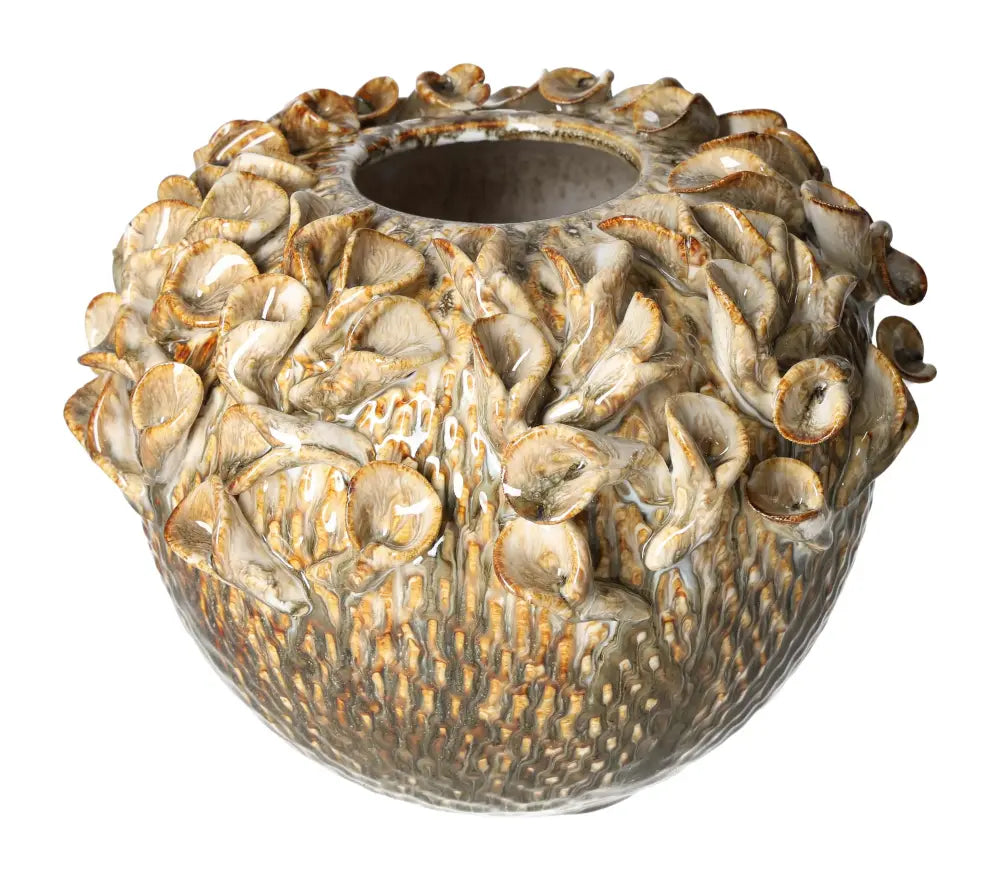 Beige stoneware vase with intricate floral design, crafted by Sylvia Crystals, blending elegance and conscious living.