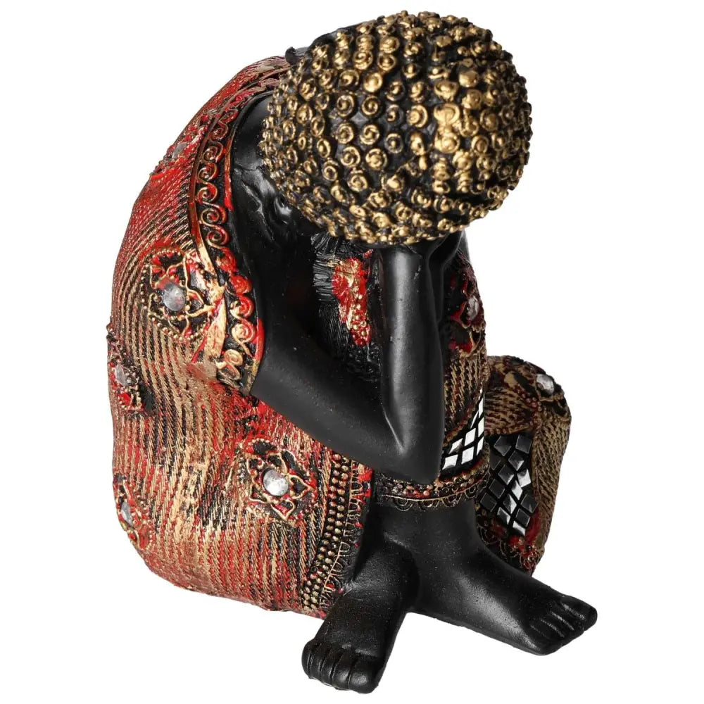 Handcrafted Black and Gold Buddha statue with intricate detailing, representing spirituality and luxury by Sylvia Crystals.