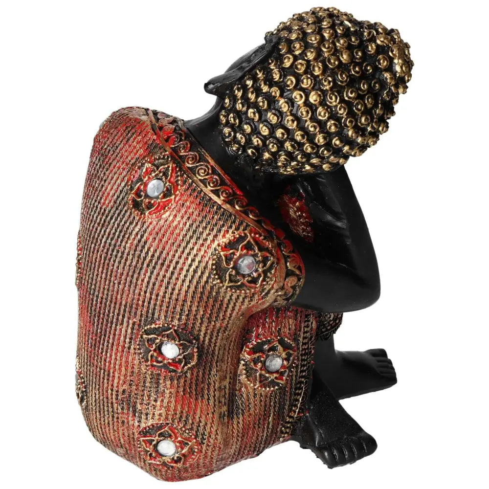 Black and Gold Buddha statue by Sylvia Crystals, showcasing intricate design with ornate detailing and spiritual elegance.