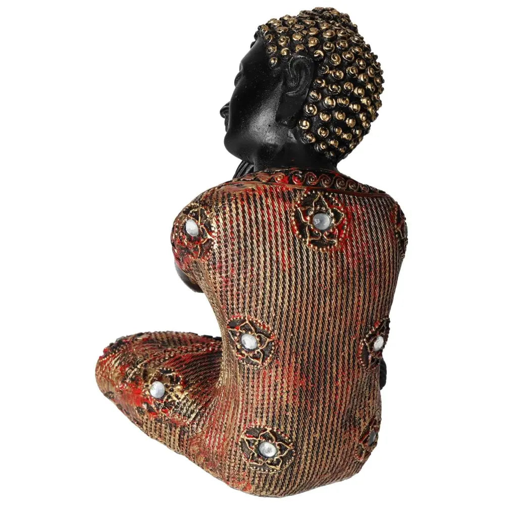 Black and Gold Buddha statue with luxurious detailing, reflecting spirituality and elegance by Sylvia Crystals.