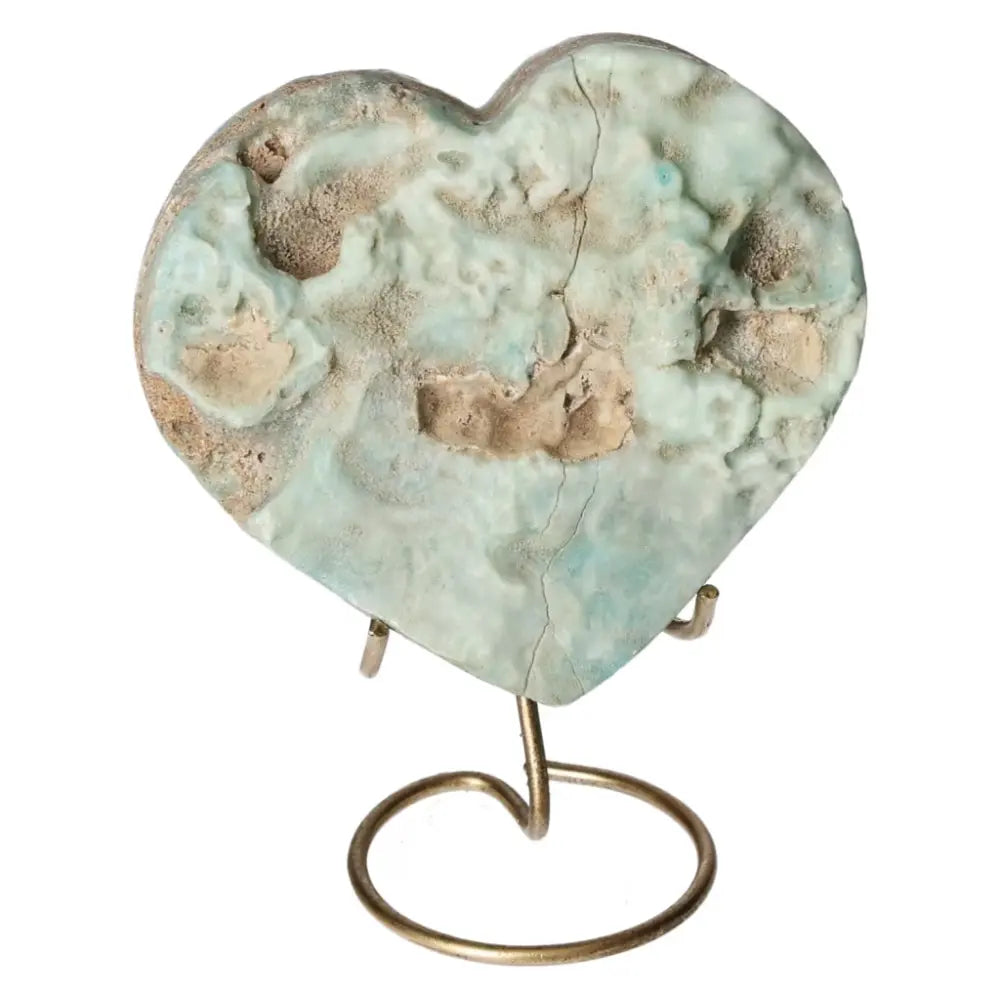 Blue Aragonite Heart crystal on stand, symbolizing emotional balance and calm, known for its soothing blue hues and elegant design.