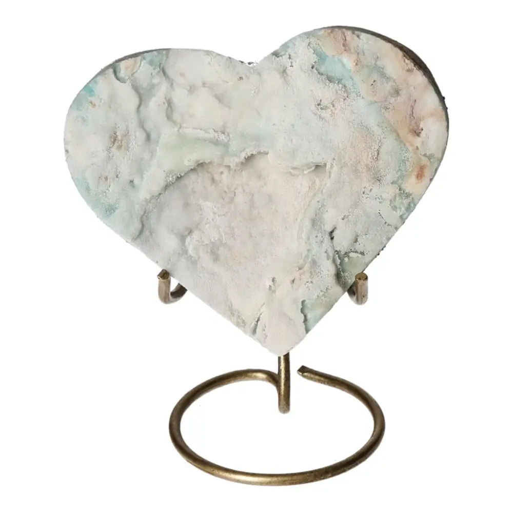 Blue Aragonite Heart crystal on stand, showcasing serene ocean-blue hues for emotional healing and spiritual connection.