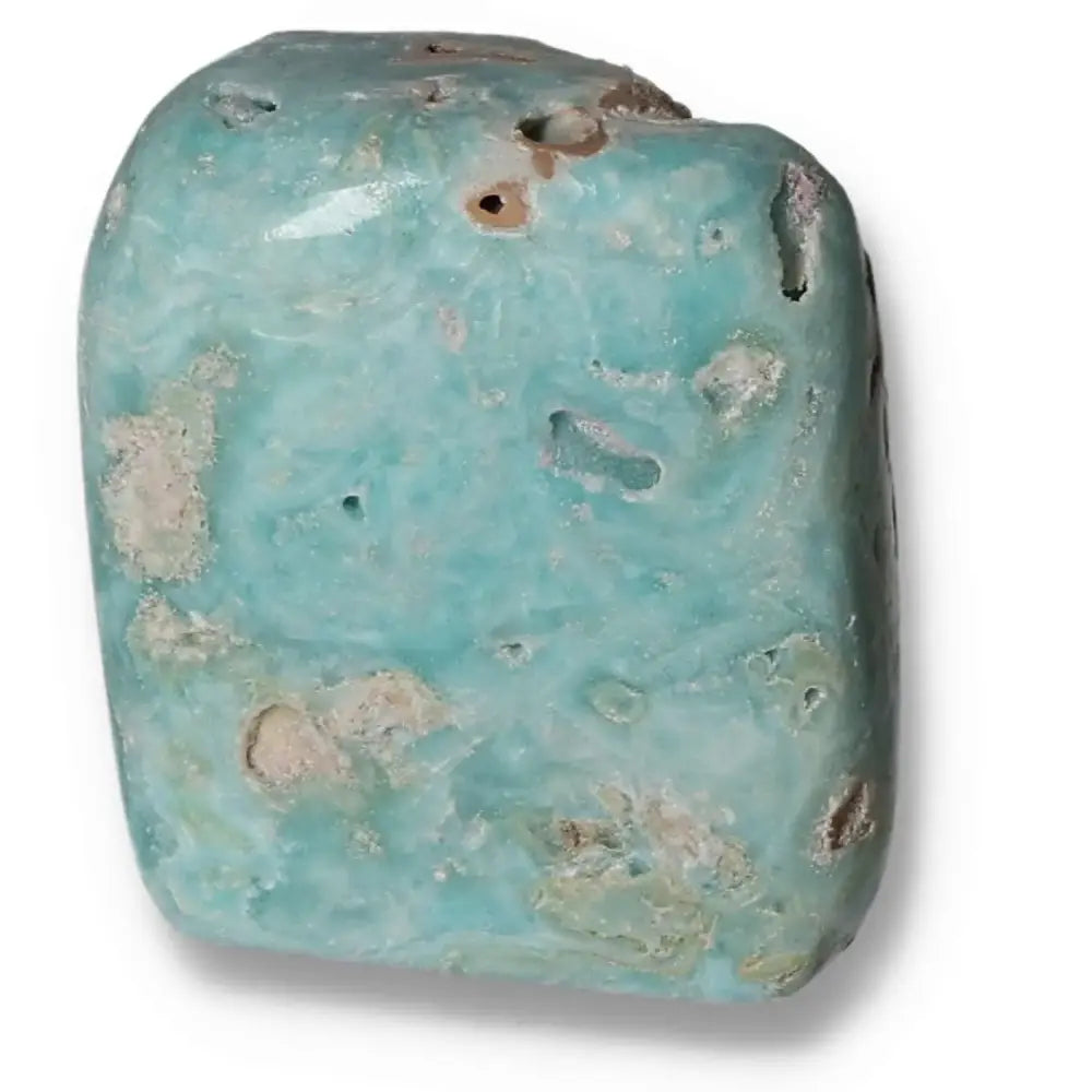 Close-up image of a soothing blue aragonite crystal obelisk from Pakistan, highlighting its vibrant hues and natural texture.