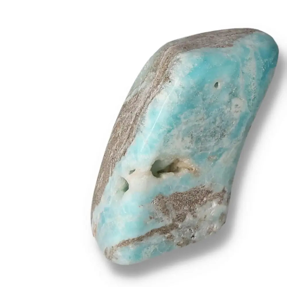 Blue Aragonite crystal obelisk from Pakistan with soothing blue hues, ideal for enhancing emotional balance and creating a tranquil environment.