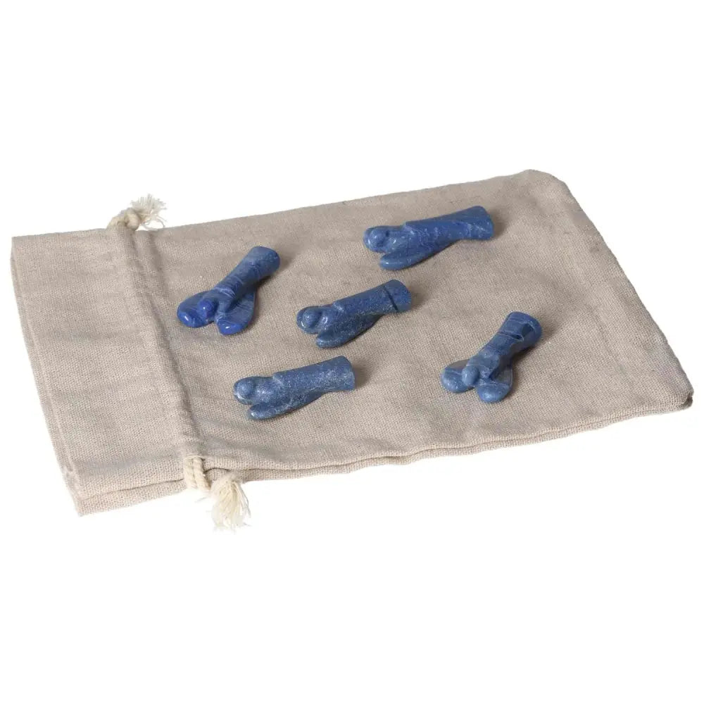 Small Blue Aventurine angels on a beige fabric pouch, symbolizing inner peace and intuition.