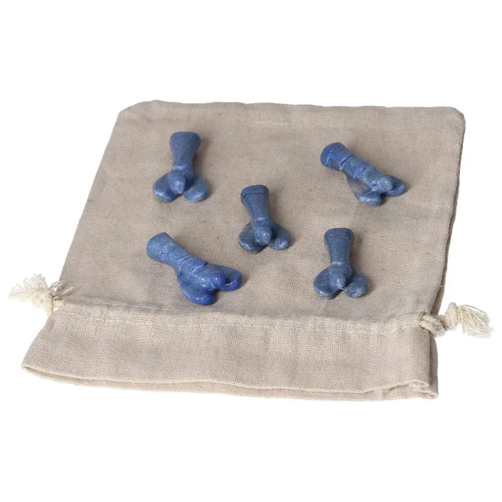 Blue aventurine small angels on a beige cloth, symbolizing inner peace, intuition, and gentle strength.