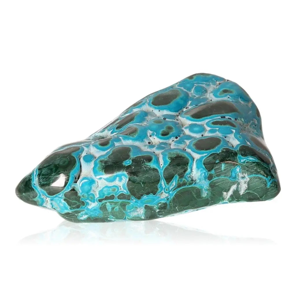 Blue Chrysocolla with Malachite gemstone, known for calming and transformative properties, on a white background.