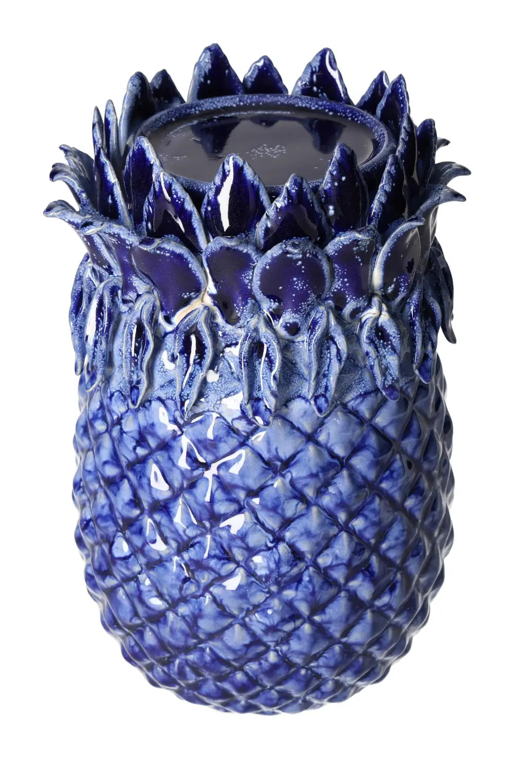 Elegant blue stoneware candle holder with intricate detailing, shaped like a pineapple, from Sylvia Crystals collection.