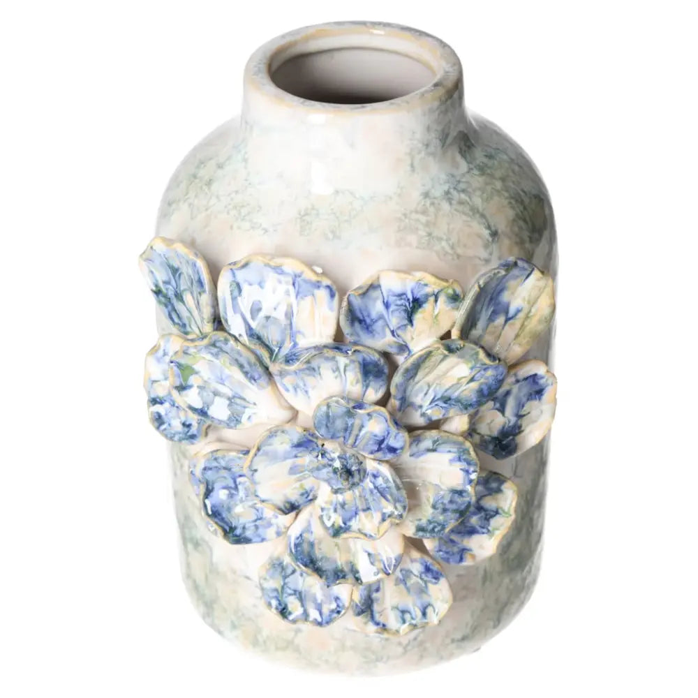 Blue stoneware vase with floral design, crafted by Sylvia Crystals, showcasing modern elegance and natural beauty in decor.