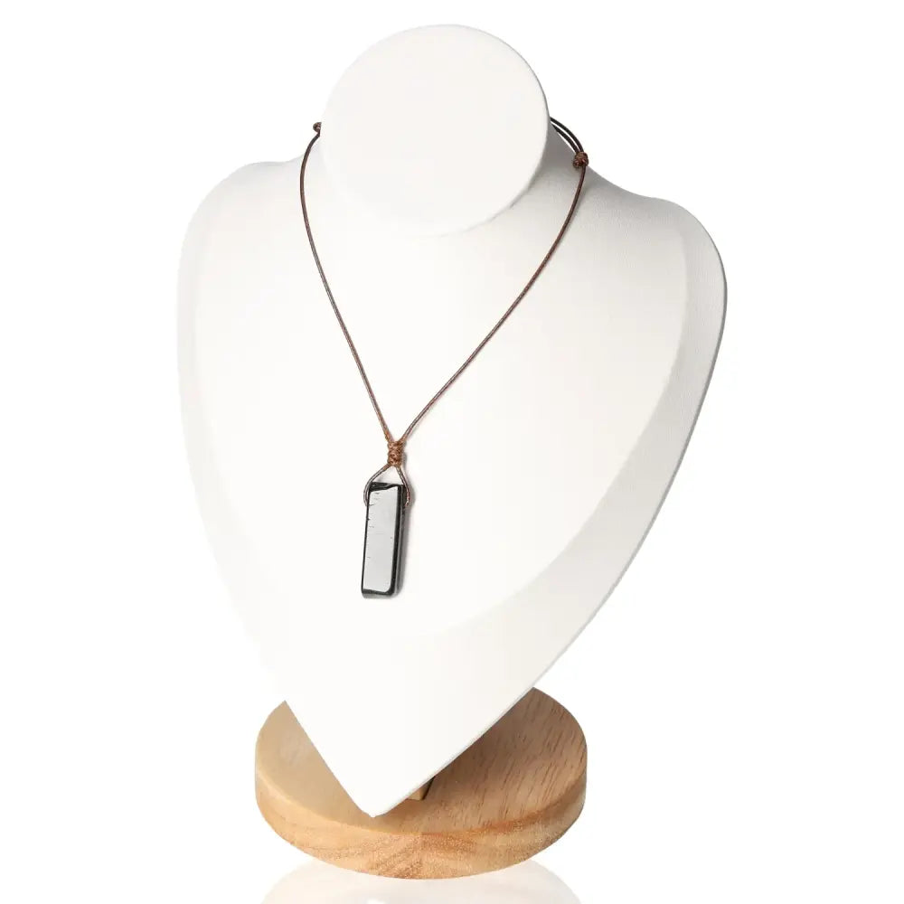 Boho Necklace Obsidian on display stand showcasing its elegant design and powerful protective qualities.